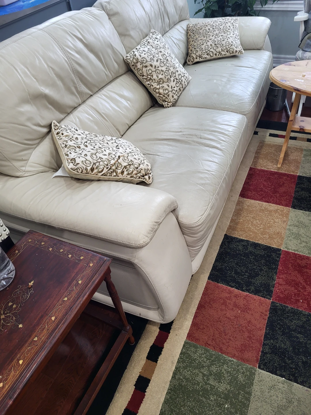 Cream Leather Sofa with Accent Pillows