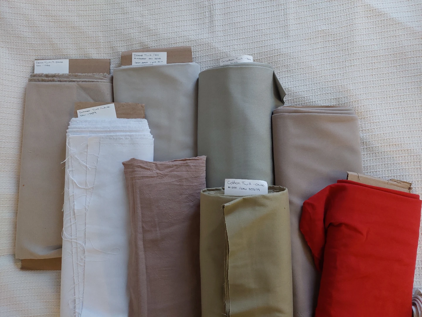 Rolls of assorted fabrics. - photo 3