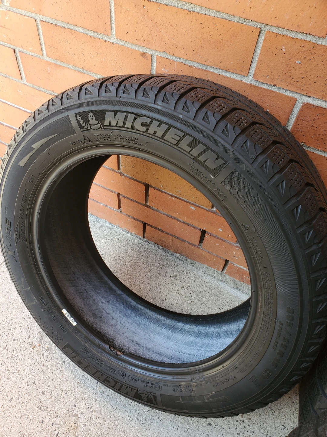 Four 205/55R16 Michelin Winter Tires - photo 4