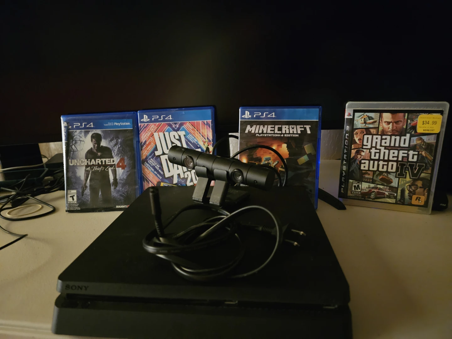 PS4 Includes 4 games + Camera (no controller)