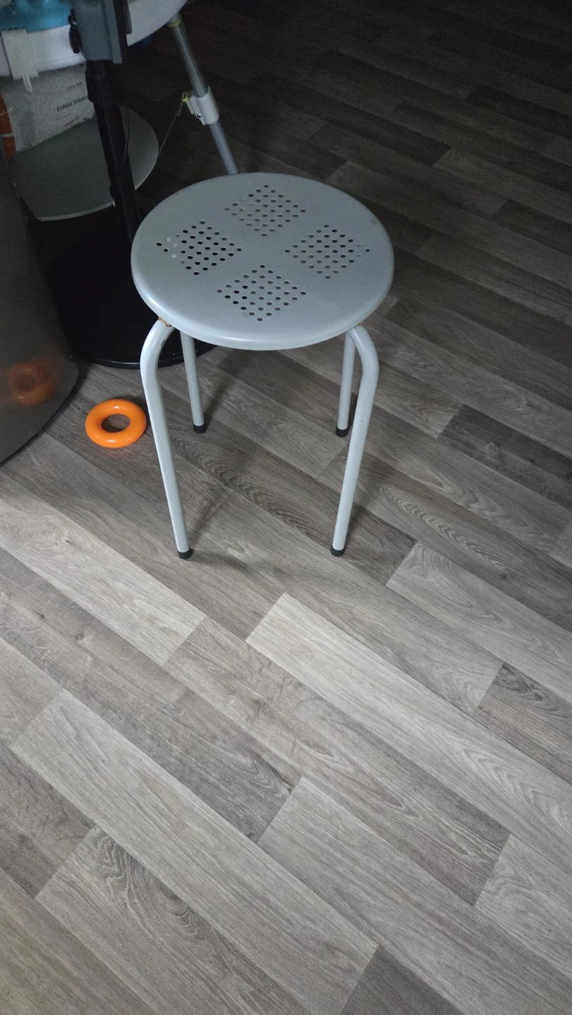 Grey metal stool