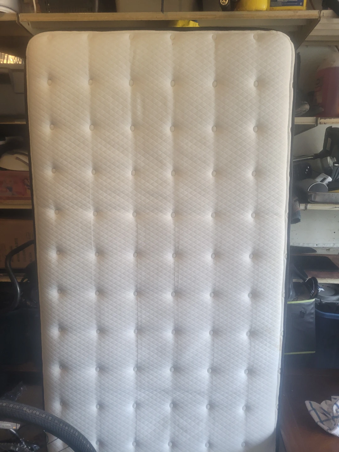 White tufted mattress