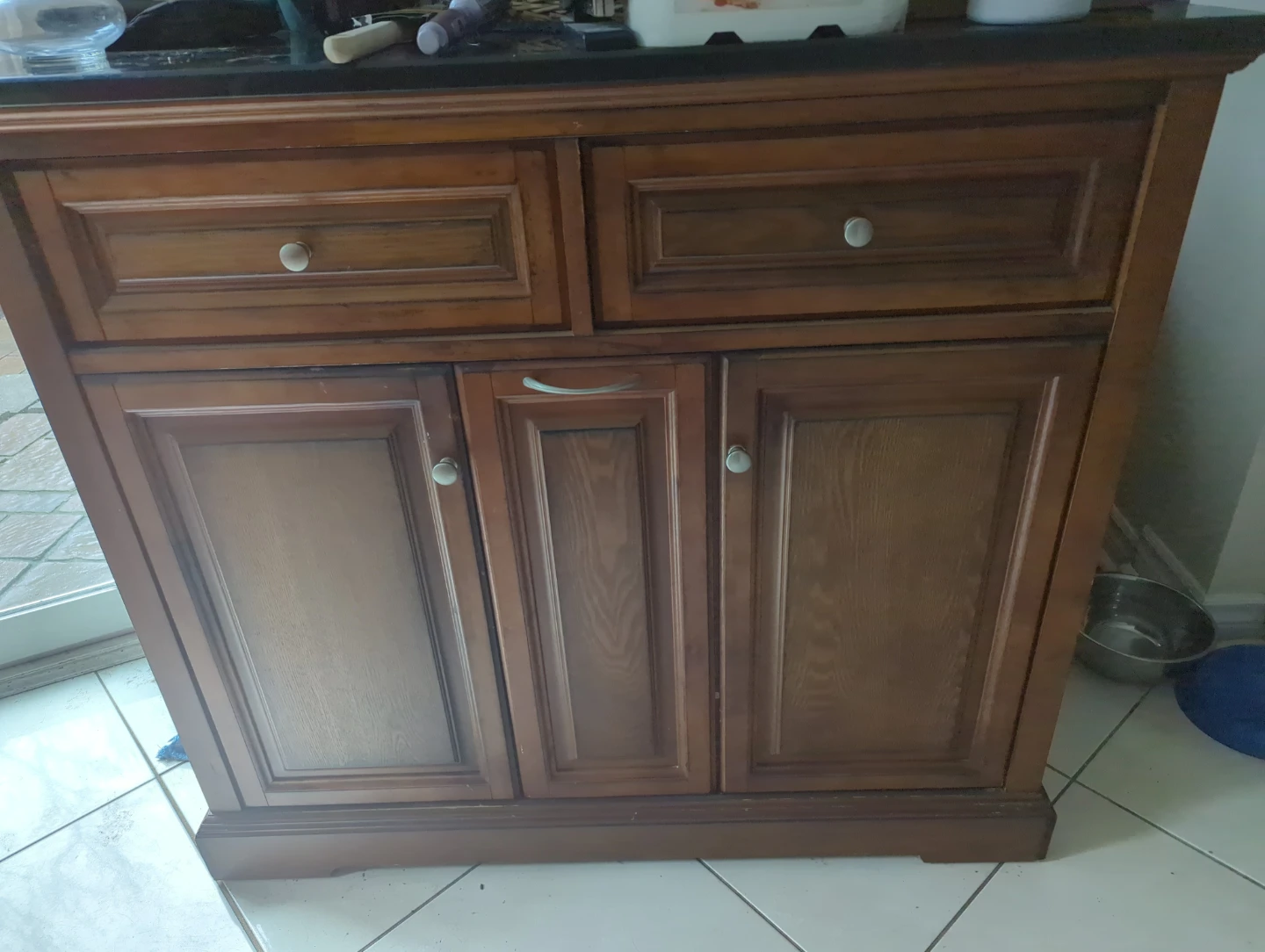 Rolling Wooden cabinet with Corian countertop