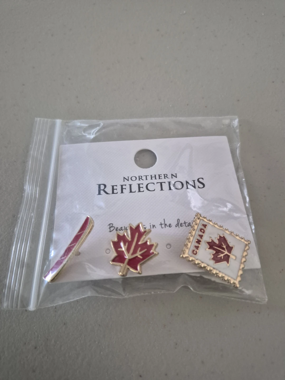 Northern Reflections Enamel Pins - Maple Leaf & Canada Stamp