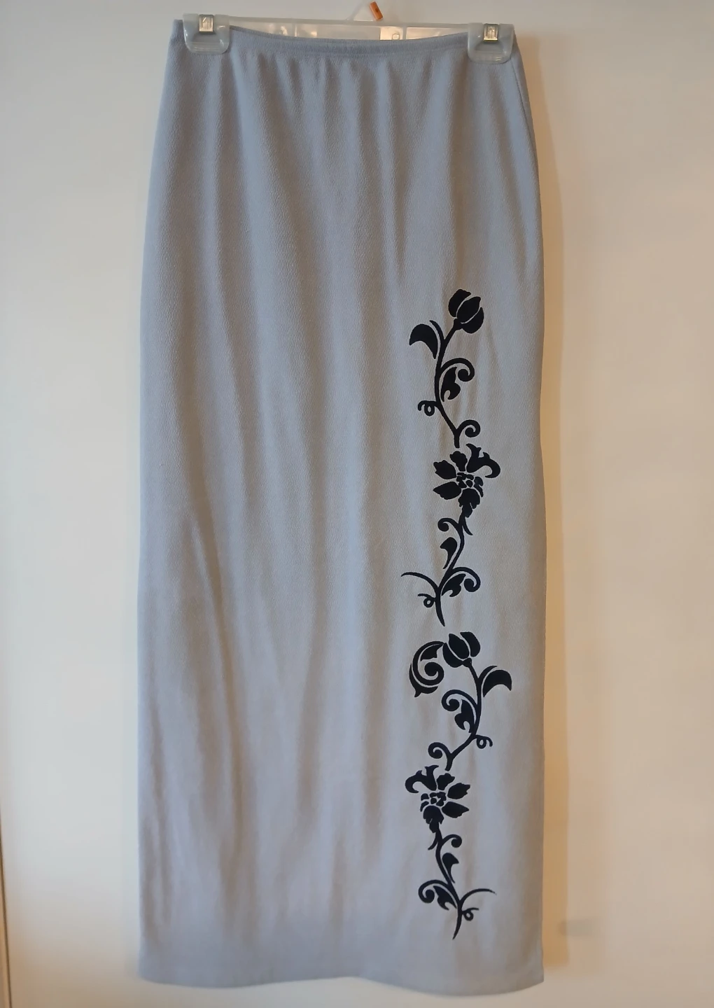 Long Skirt, Zip-Up Cardigan and mid length skirt.