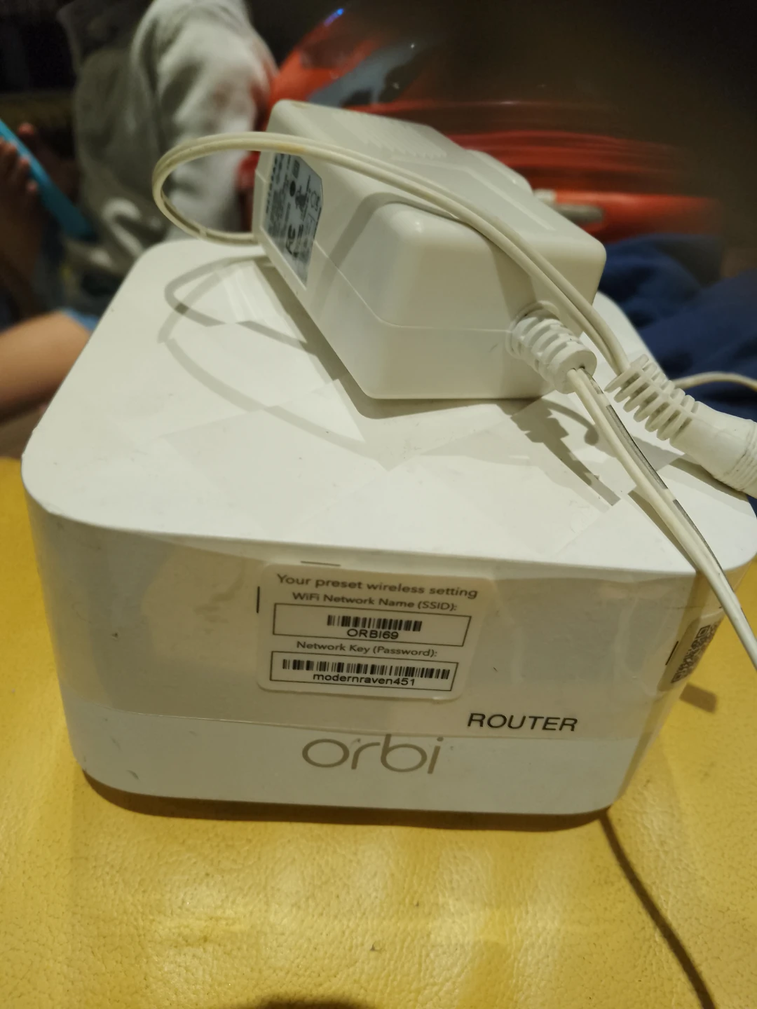 White Wi-Fi Router with Power Adapter