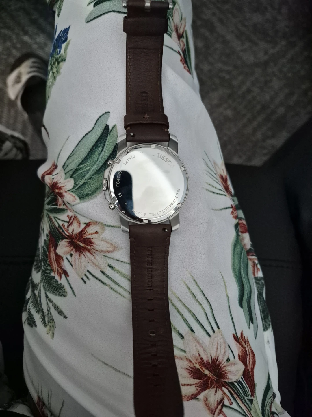 Men watch Fossil