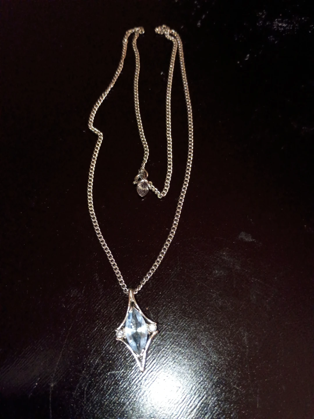 Silver tone necklace with blue crystal pendant - photo 2