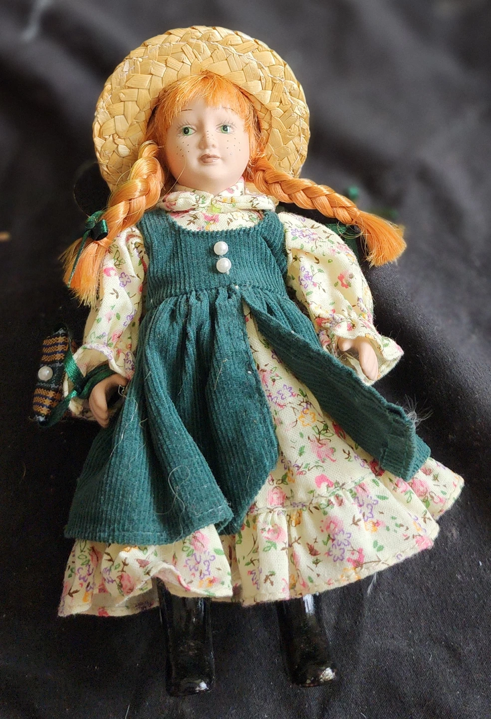 Collectible Porcelain Doll with Straw Hat