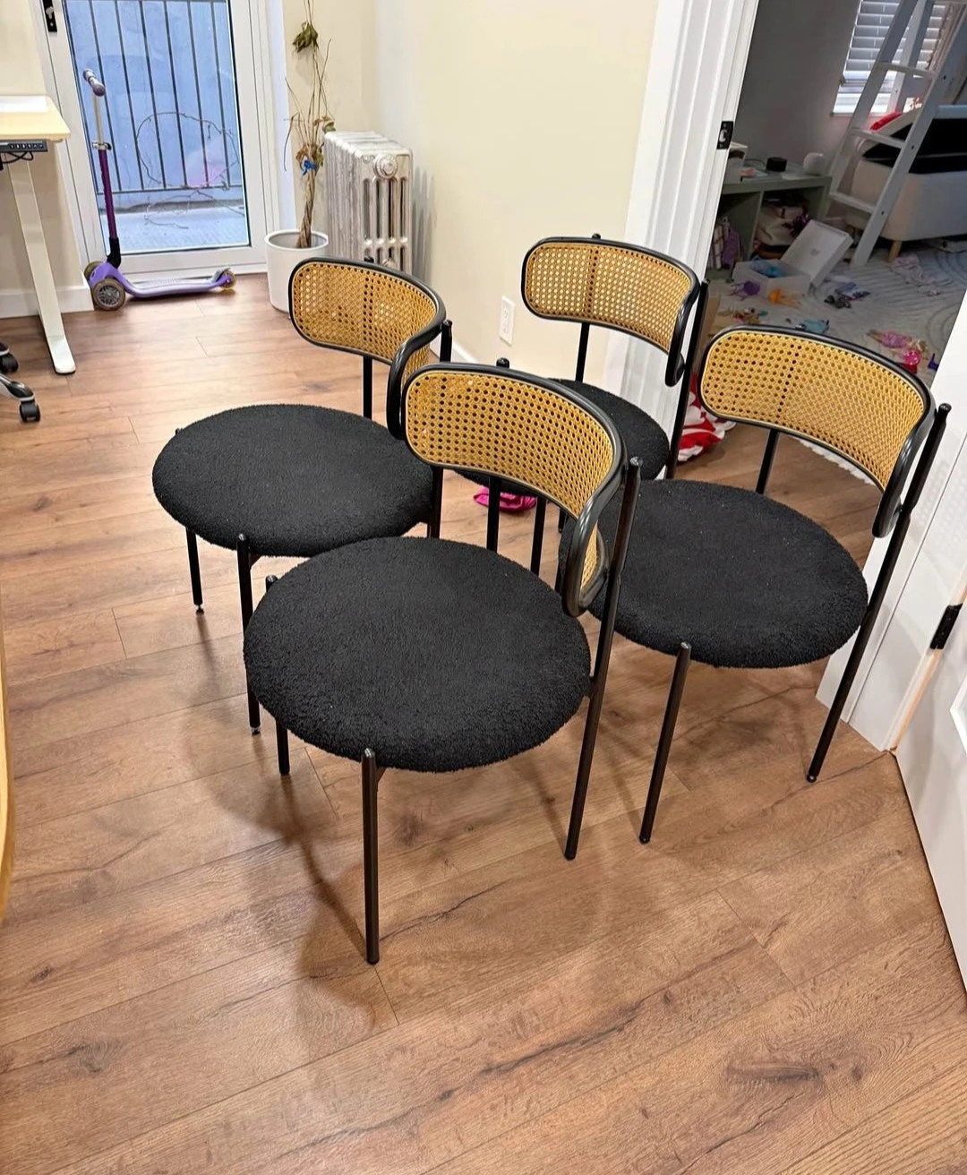 Set of 4 Black Boucle Dining Chairs with Rattan Back