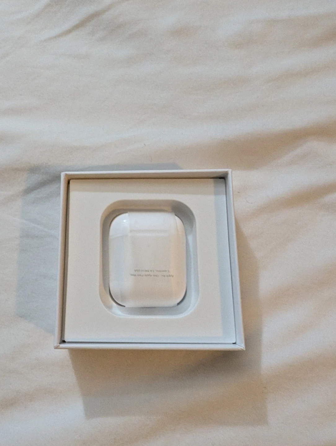 Apple AirPods with Charging Case - photo 3