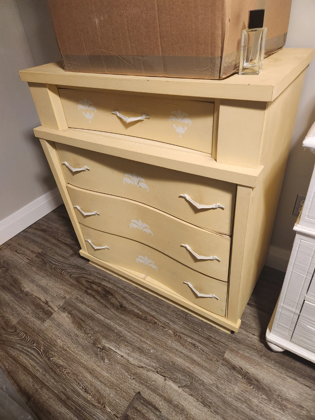 Yellow 4-Drawer Dresser with Decorative Accents