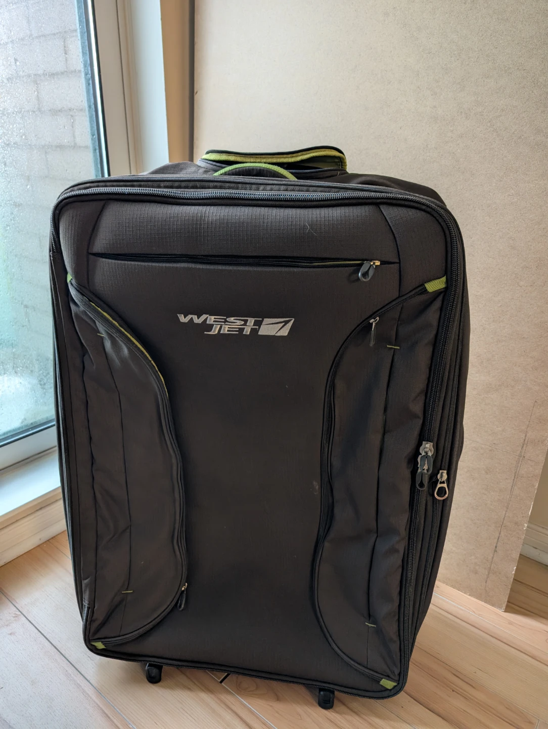 WestJet Rolling Suitcase