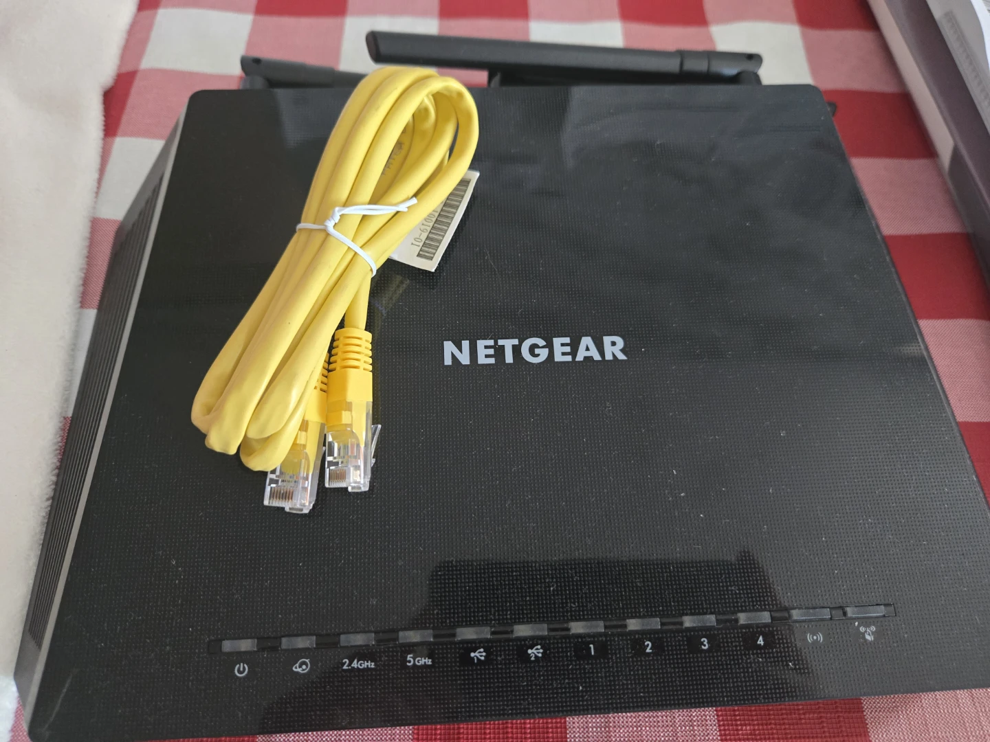 NETGEAR Wireless Router with Yellow Ethernet Cable