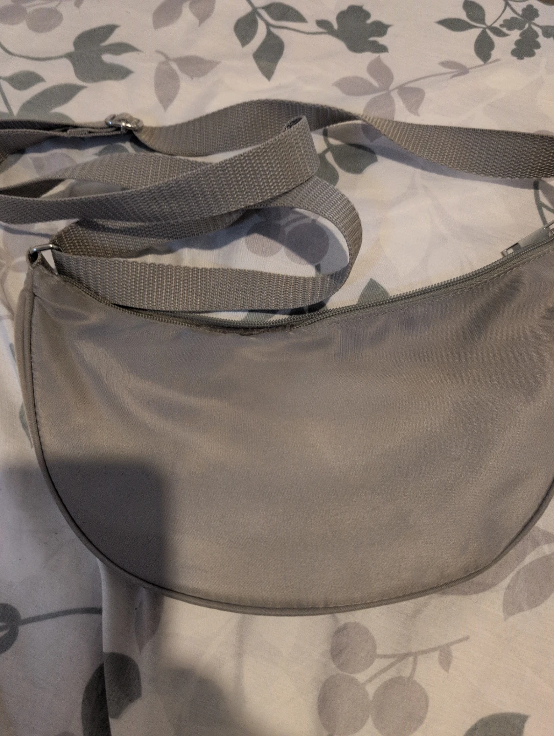 Grey crescent crossbody bag
