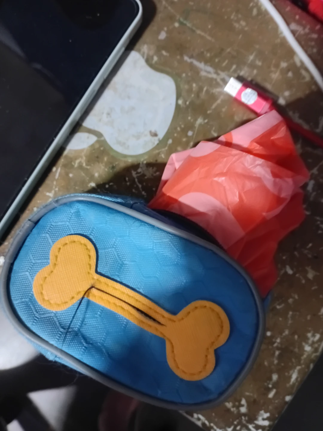 Blue dog waste bag dispenser with bone accent