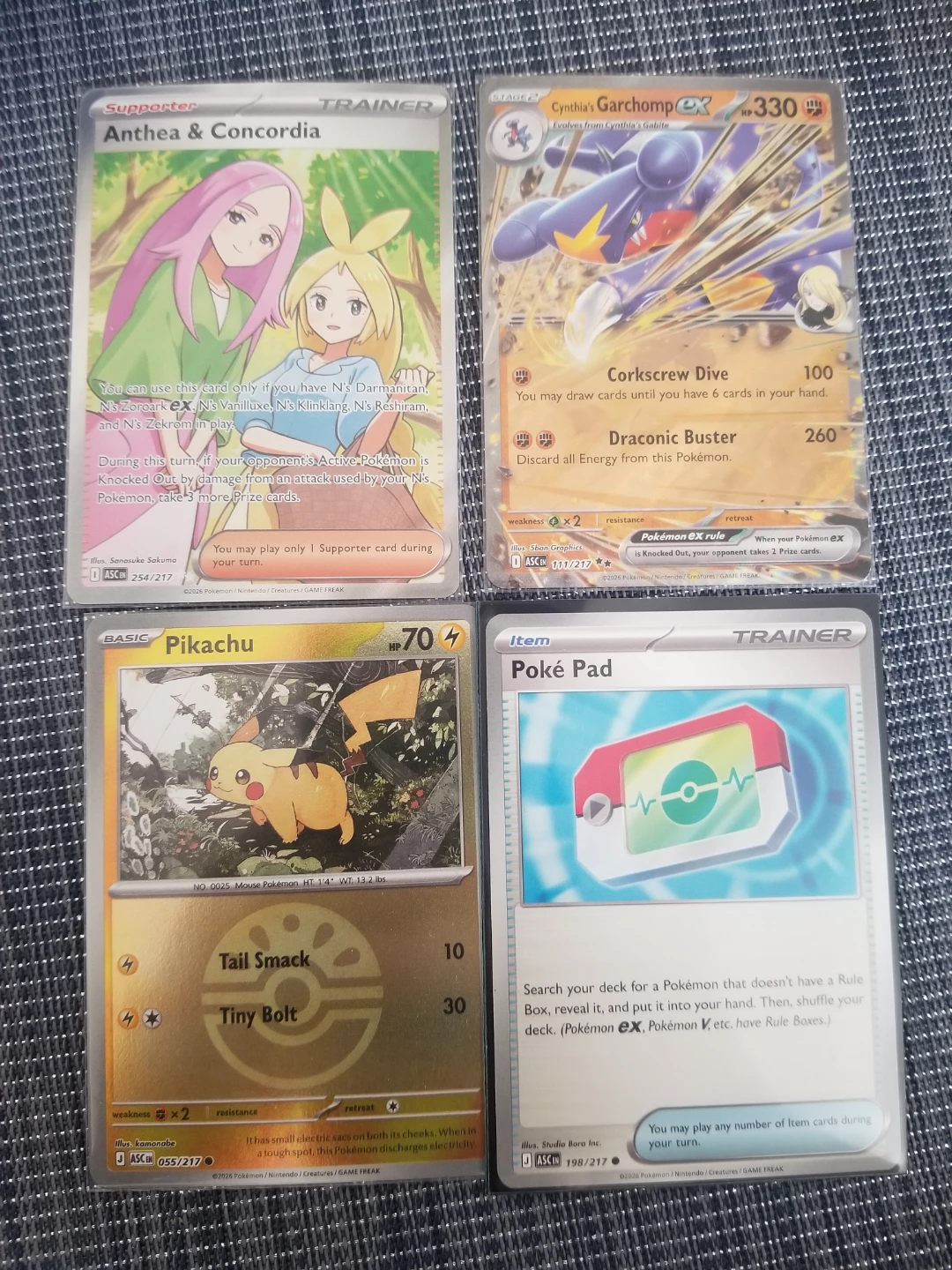 Pikachu, Anthea & Concordia, Cynthia's Garchomp EX, Poké Pad