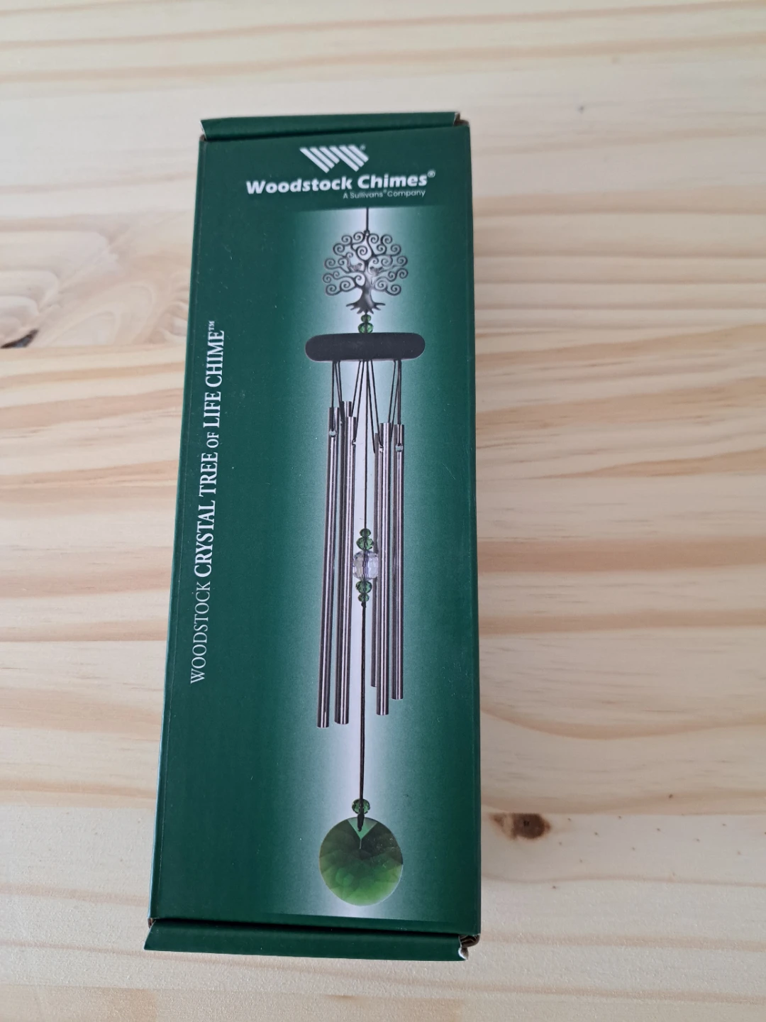 wind chime made of wood, glass and metal