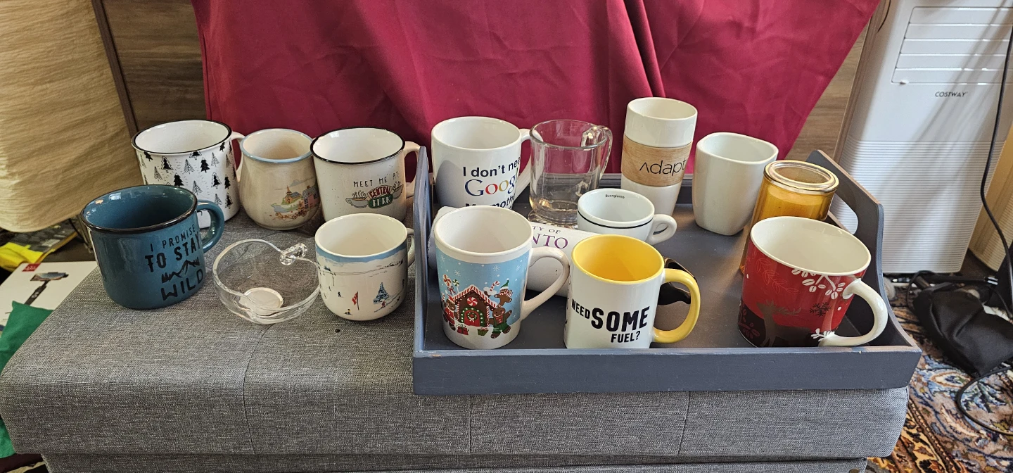 Collection of Assorted Mugs and Water Bottle