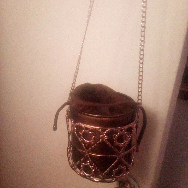 Brown drawstring bucket bag with ornate gold cage - photo 2