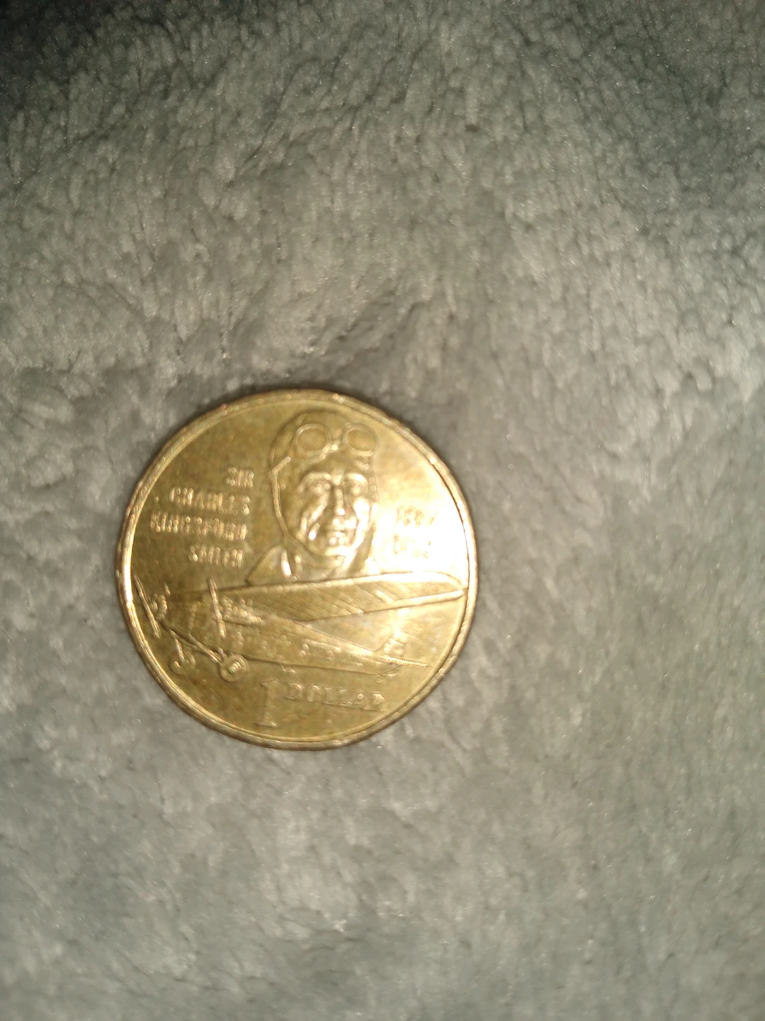 Australian $1 coin commemorating Sir Charles Winfred Smith
