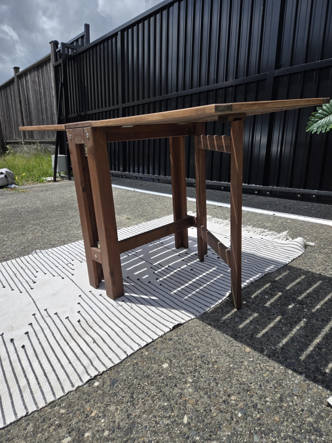 Newly sanded stained Ikea solid wood folding patio table - photo 3