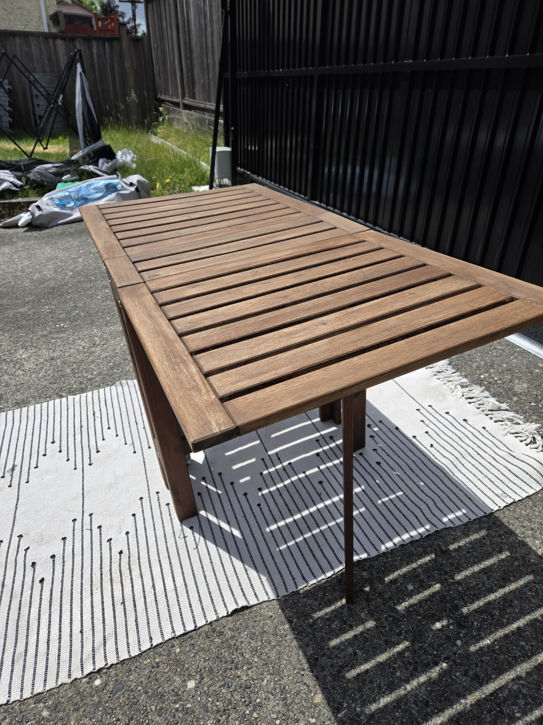 Newly sanded stained Ikea solid wood folding patio table - photo 4