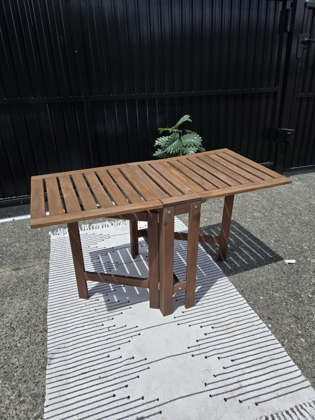 Newly sanded stained Ikea solid wood folding patio table - photo 5