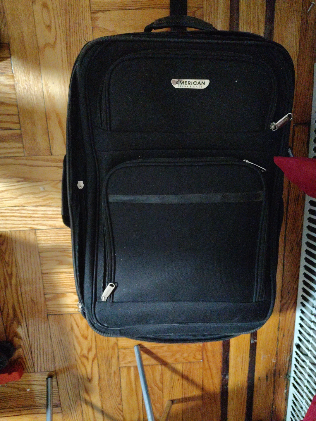 American Tourister Black Rolling Luggage Suitcase