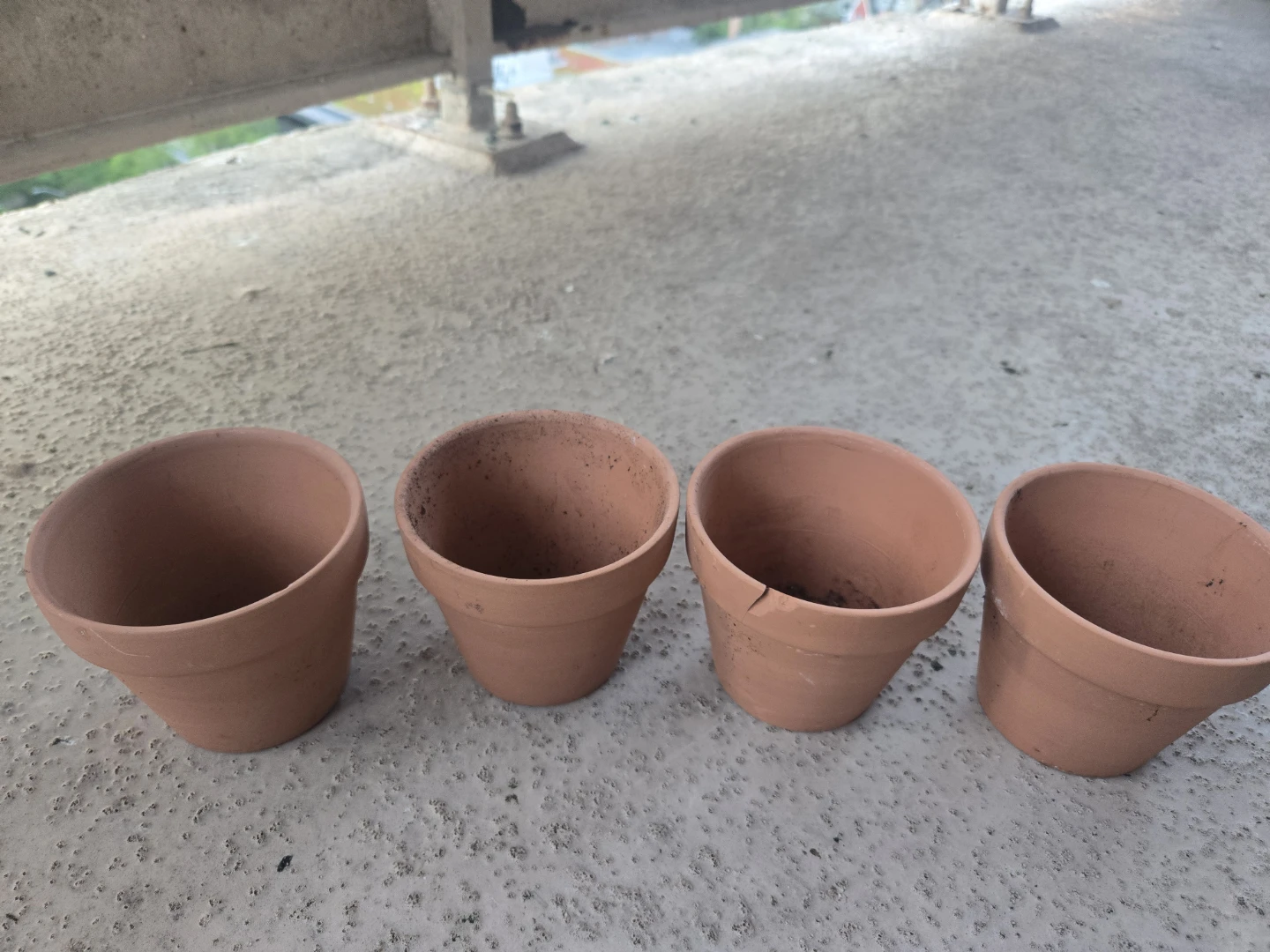 Four Small Terracotta Pots