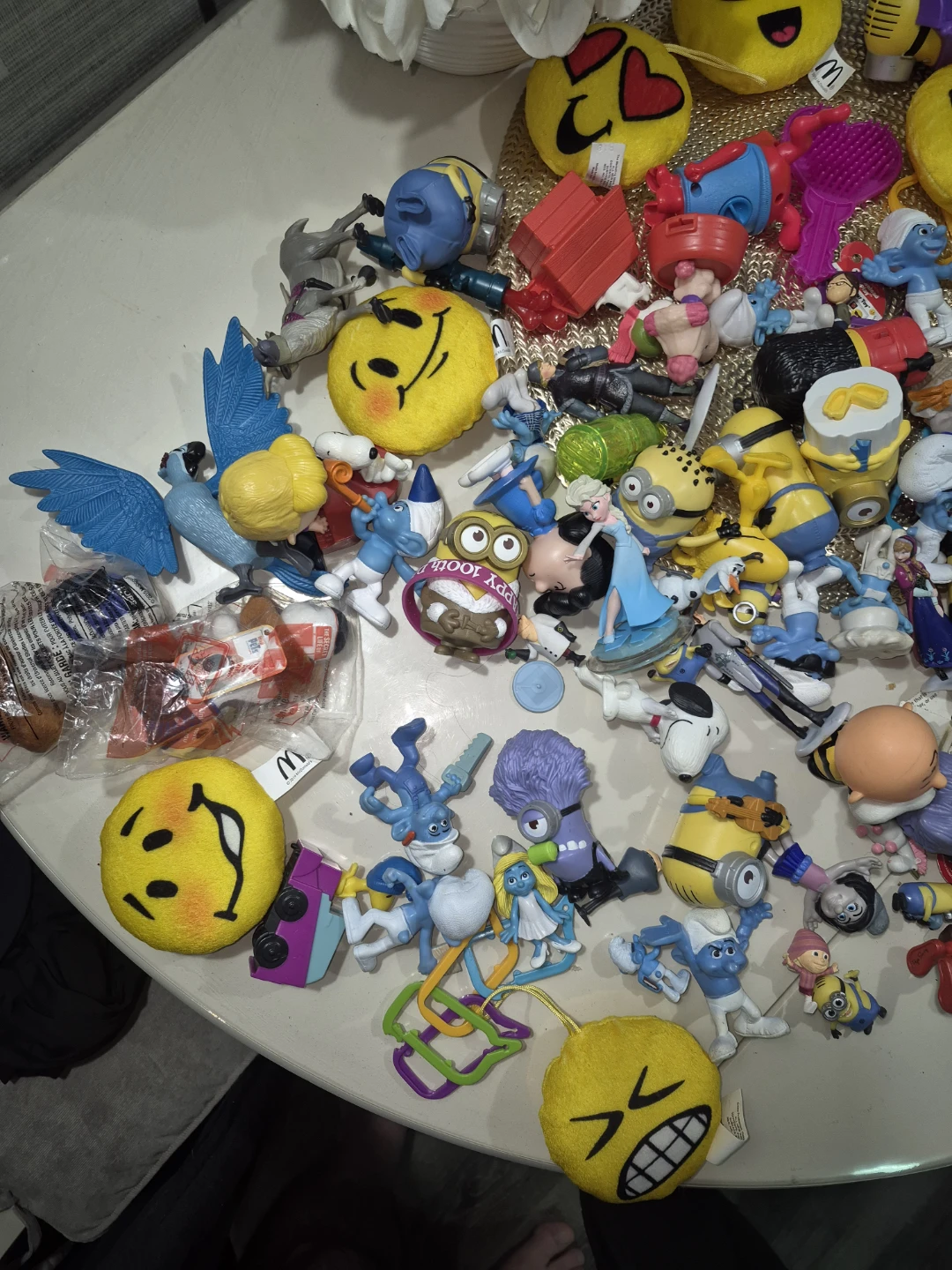 Assorted Minions, Smurfs, and Emoji Toys