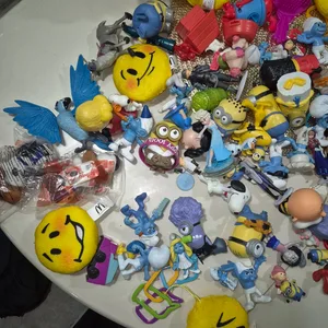 Assorted Minions, Smurfs, and Emoji Toys