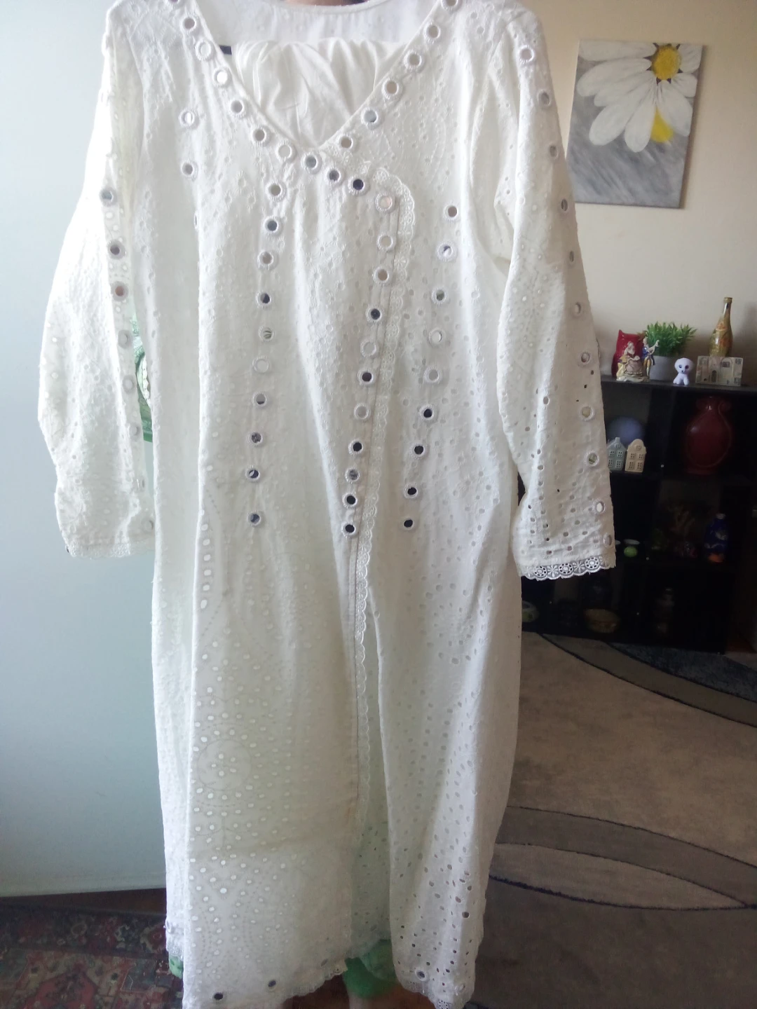 Three traditional South Asian style kurtis