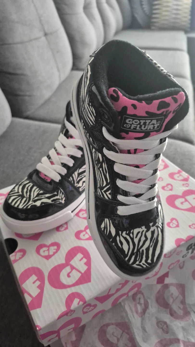Gotta Flurt Zebra Print High Top Sneakers