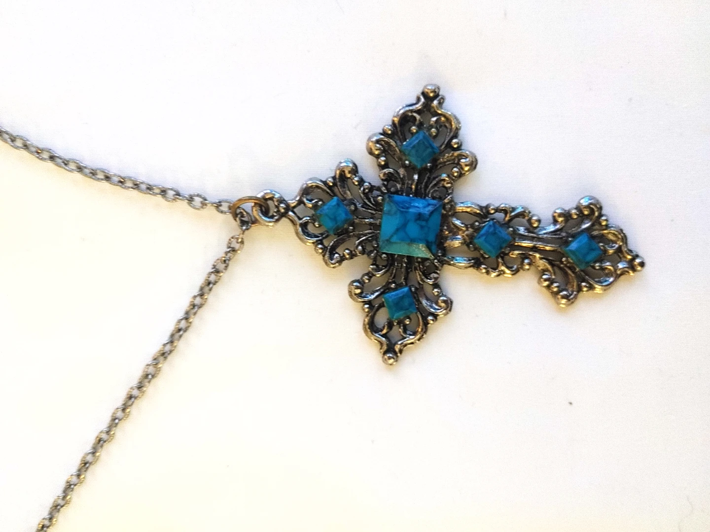 Ornate Cross Necklace with Blue Stones