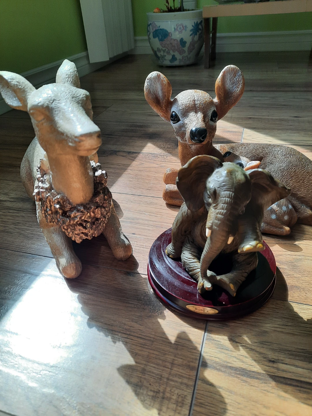 Collection of 3 animal figurines: deer family and elephant