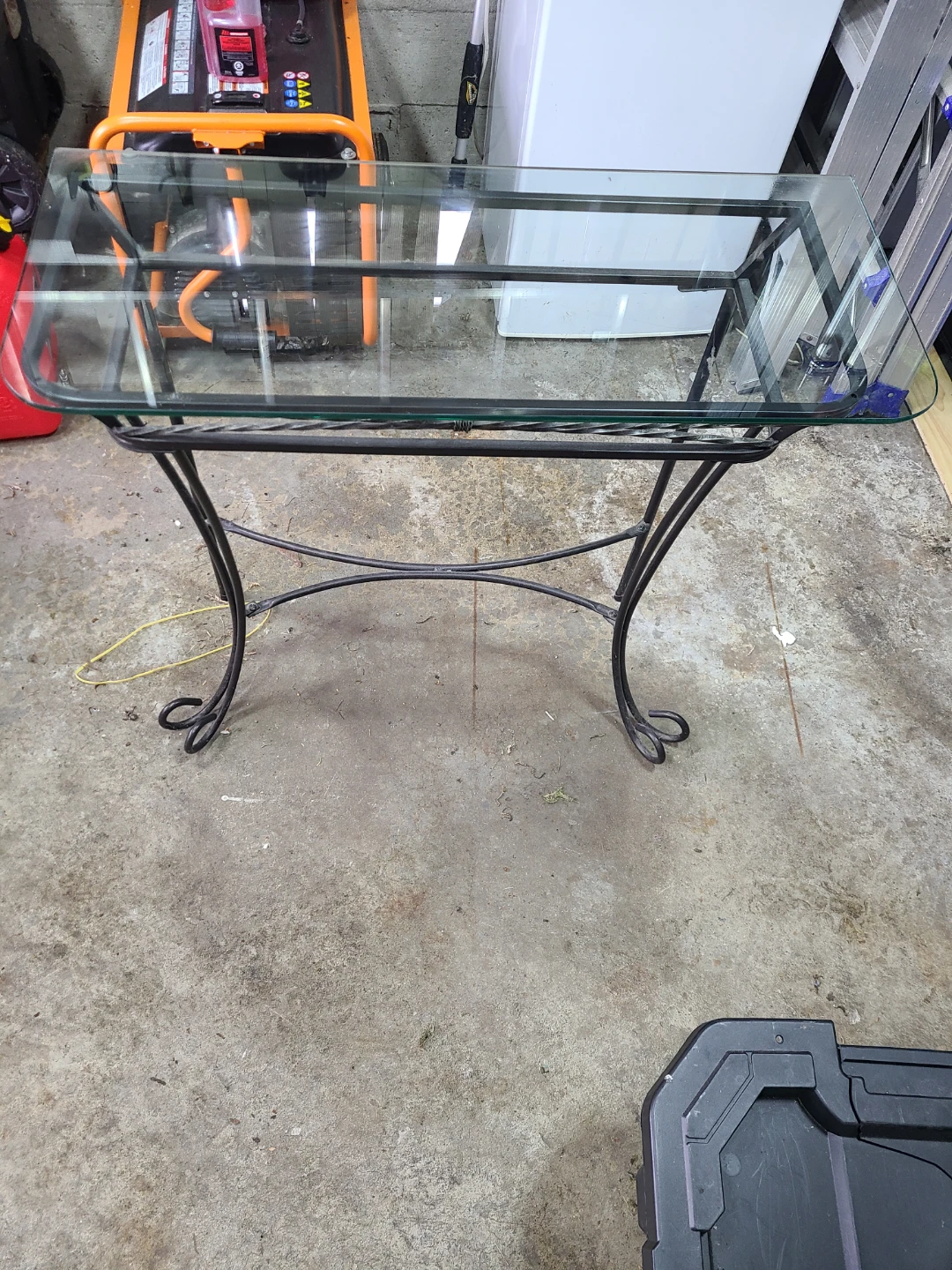 Glass top metal console table