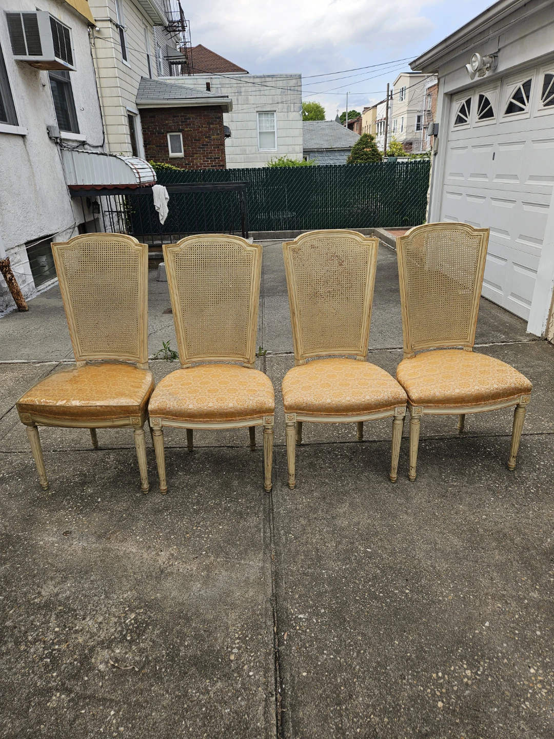 4 vintage cane back chairs