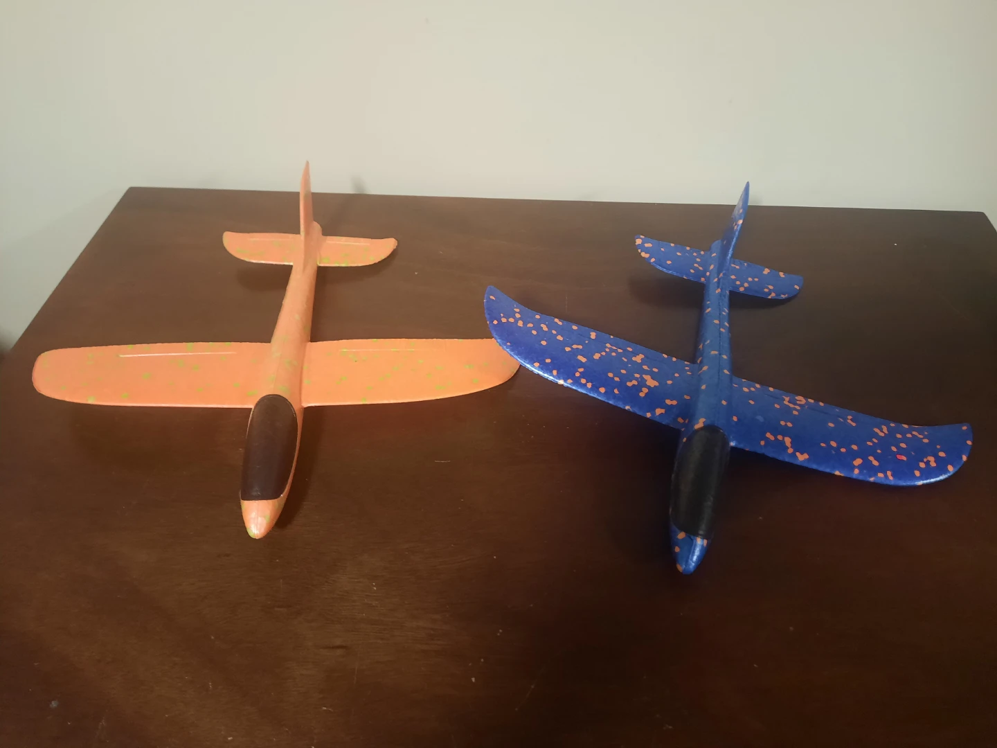 Two Foam Glider Airplanes - Orange and Blue