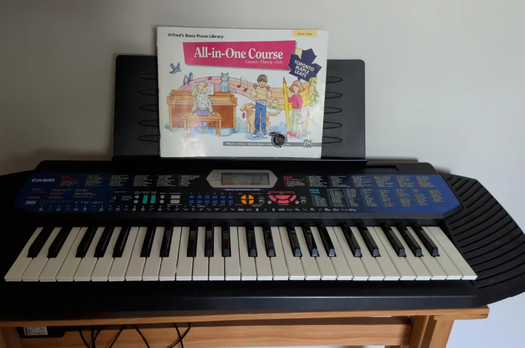 Casio CTK-411 Keyboard with Music Book