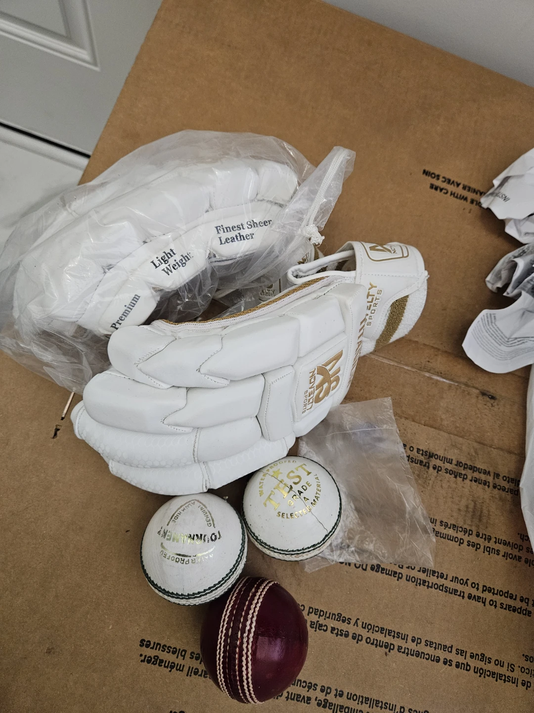 Noveltys Sports Cricket Batting Pads and Balls