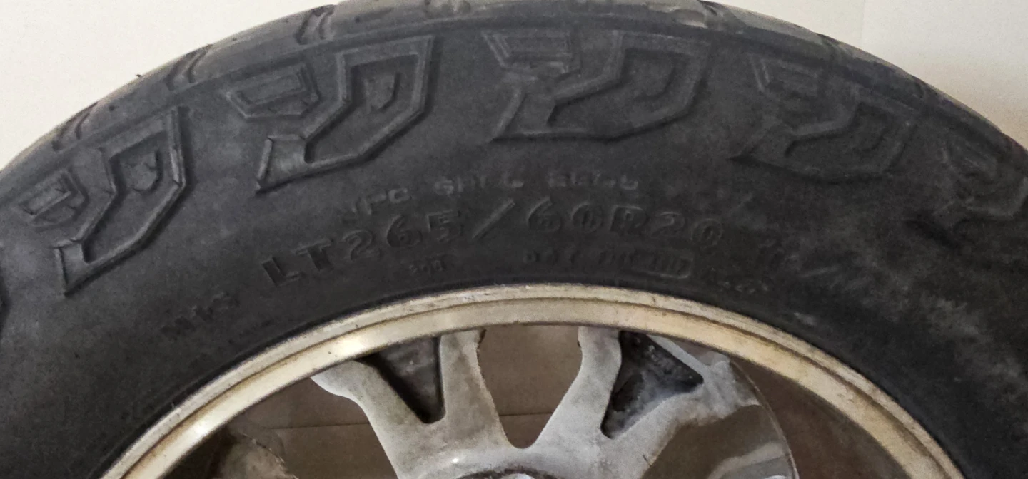Nissan Wheels and Goodyear Wrangler Tires LT265/60R20 - photo 4