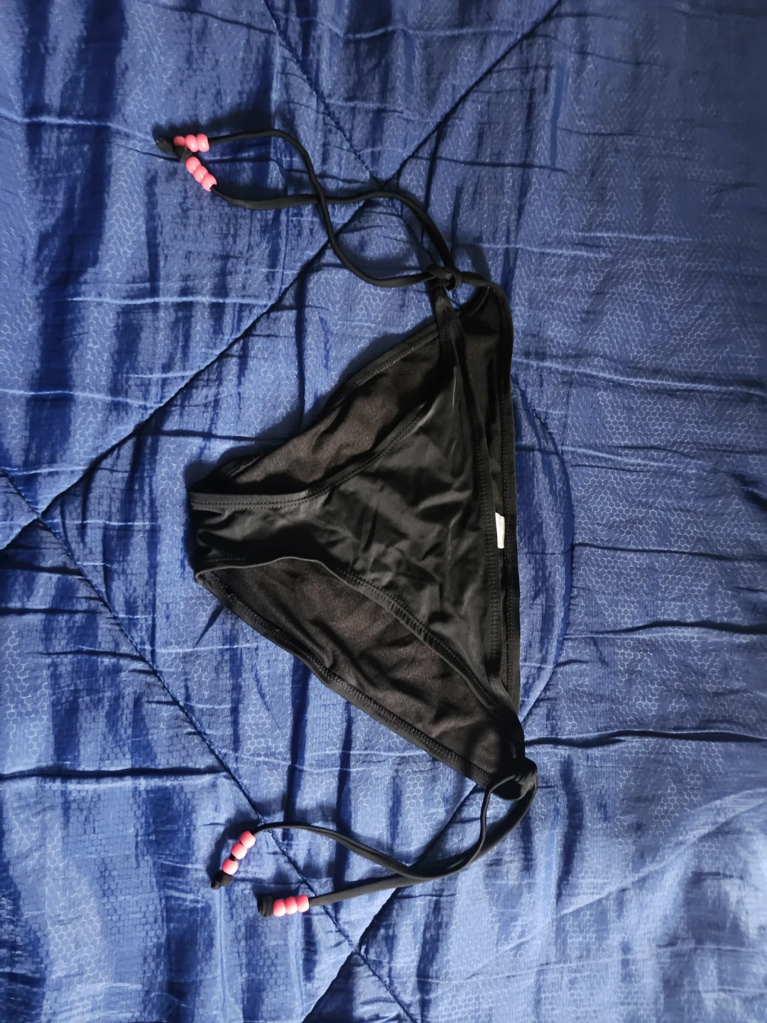 Black bikini bottoms with pink bead ties