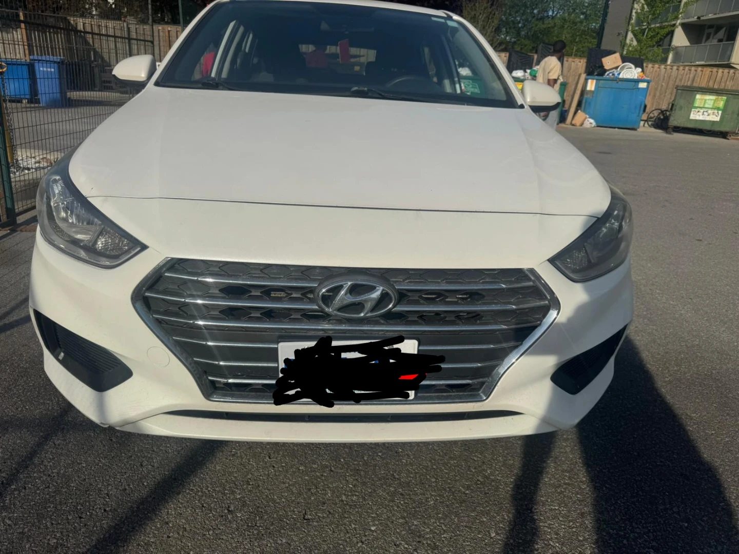 White Hyundai Accent Hatchback