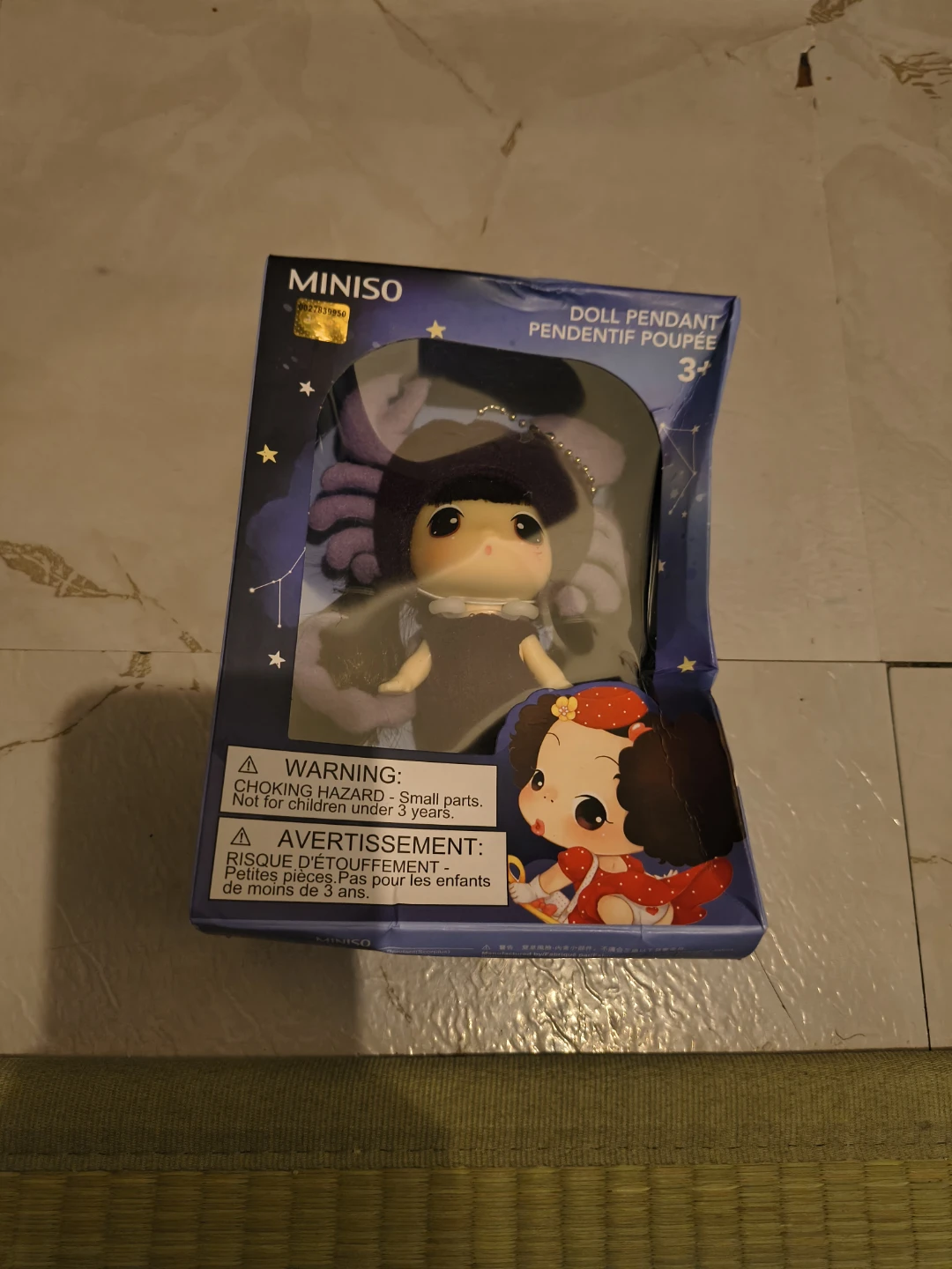 Scorpio doll in box