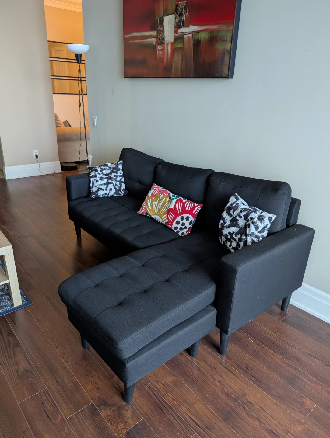 Black Sectional Sofa with Cushions