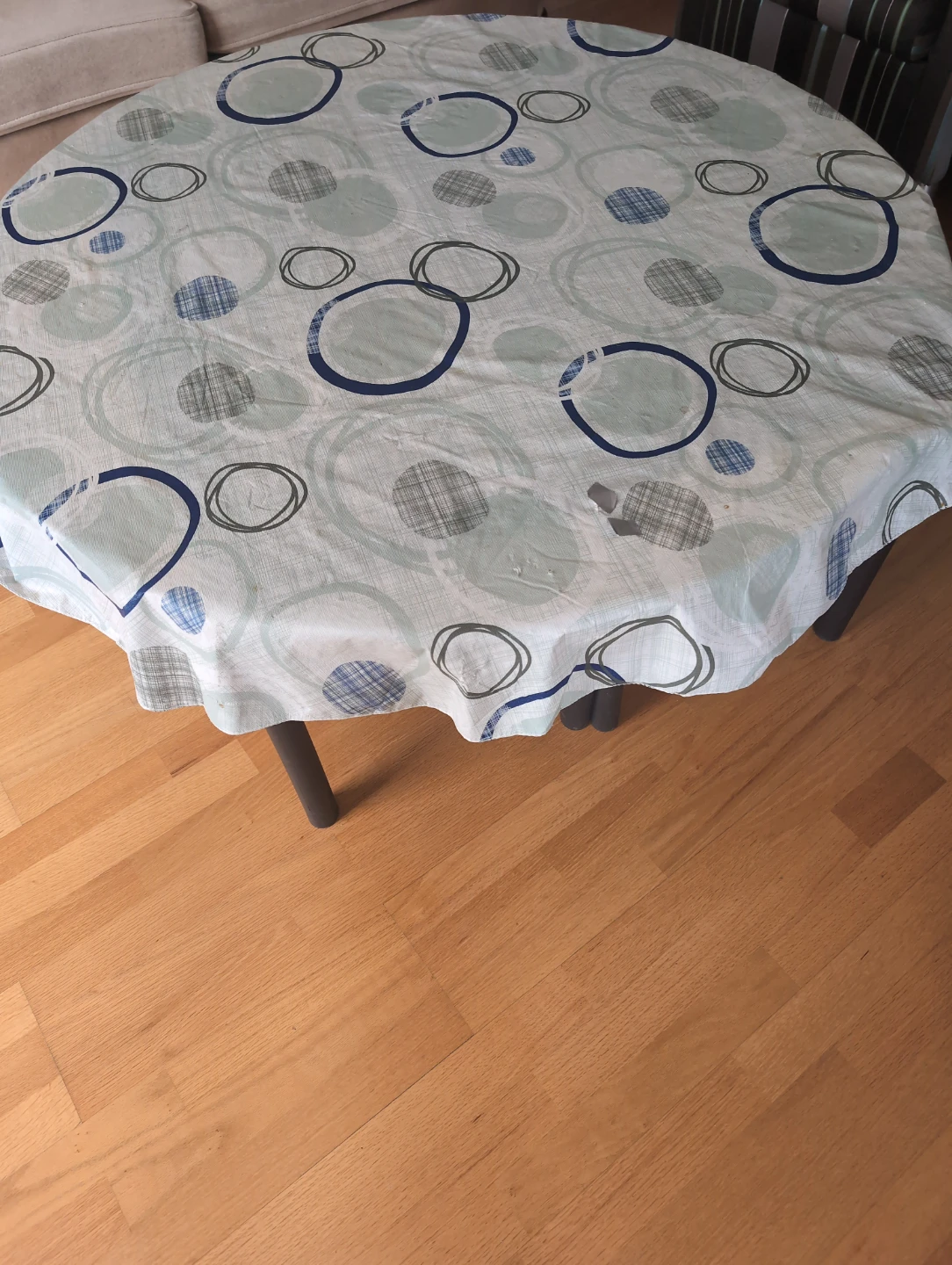 Round Table with Glass Top and Tablecloth