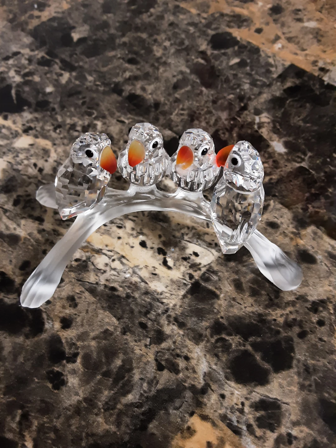 Swarovski crystal baby lovebirds perched on Branch Figurine