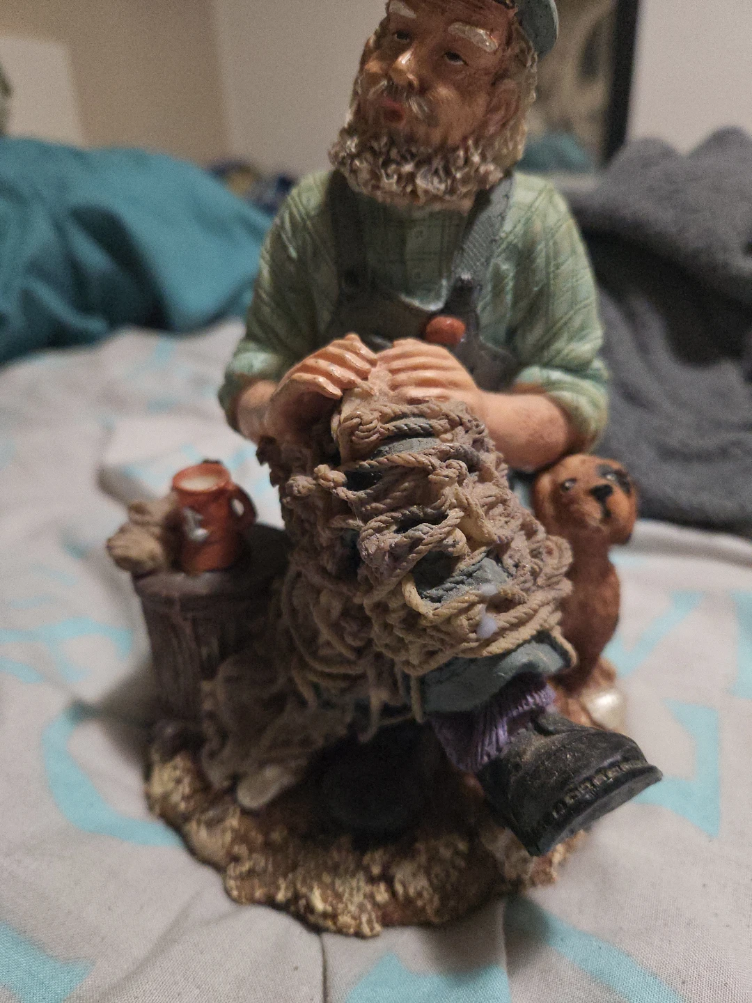Figurine of a man knitting with a dog - photo 3
