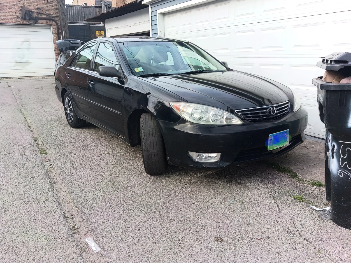 Black Toyota Camry LE Sedan